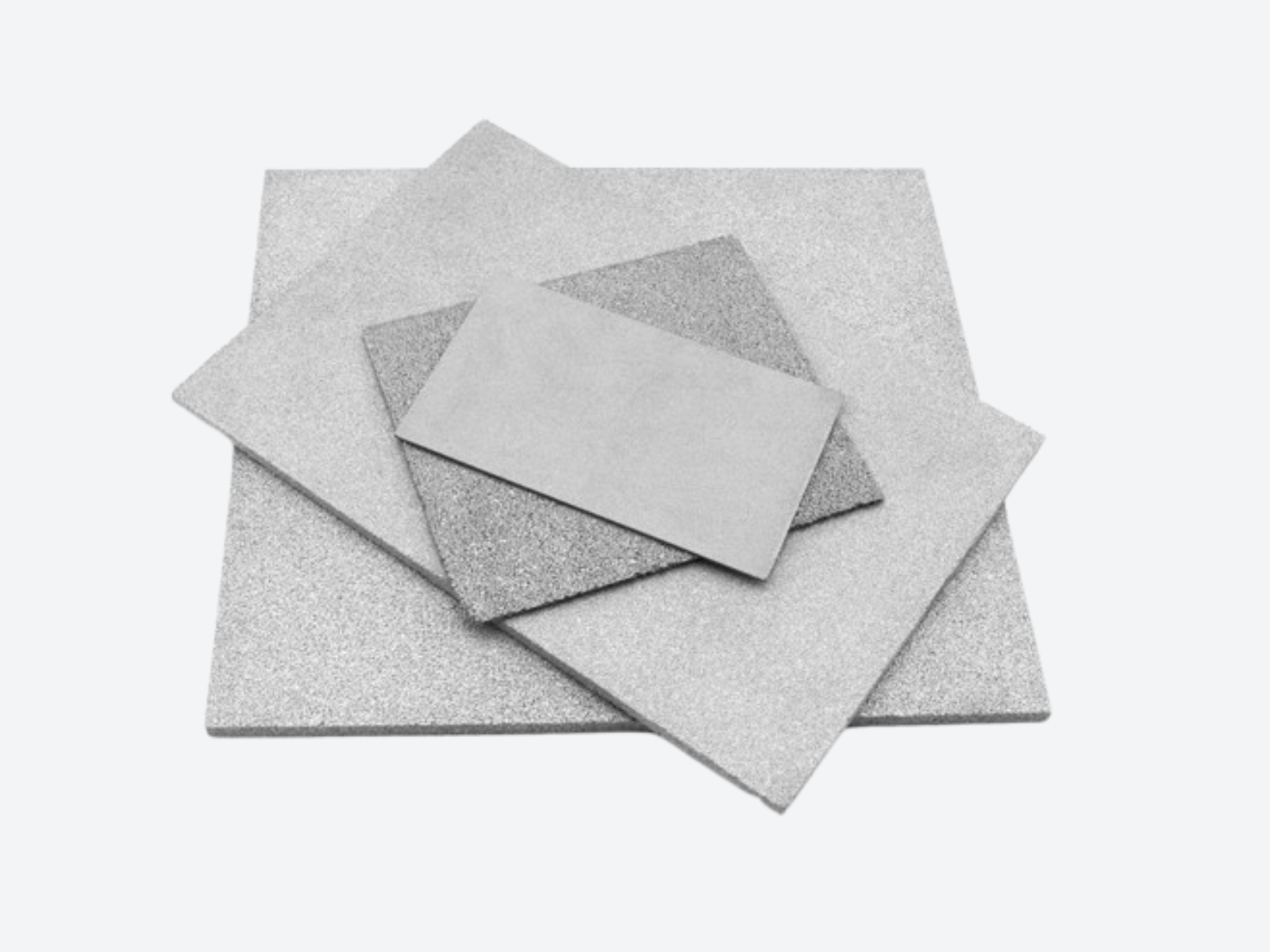 Sintered porous metal sheets for filtration and flow distribution